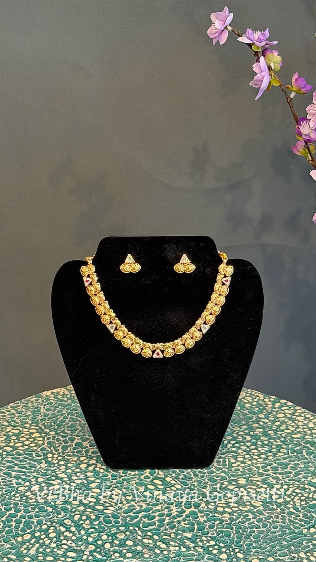 Gold Finish Leaf Motif Necklace Set with Pink and Clear Stones