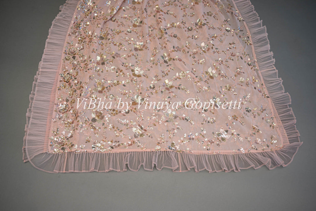 Pastel Peach Georgette Sequins Ruffle Border Saree And Blouse