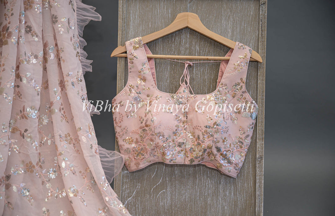 Pastel Peach Georgette Sequins Ruffle Border Saree And Blouse