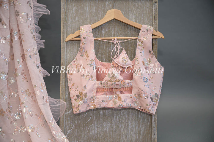 Pastel Peach Georgette Sequins Ruffle Border Saree And Blouse