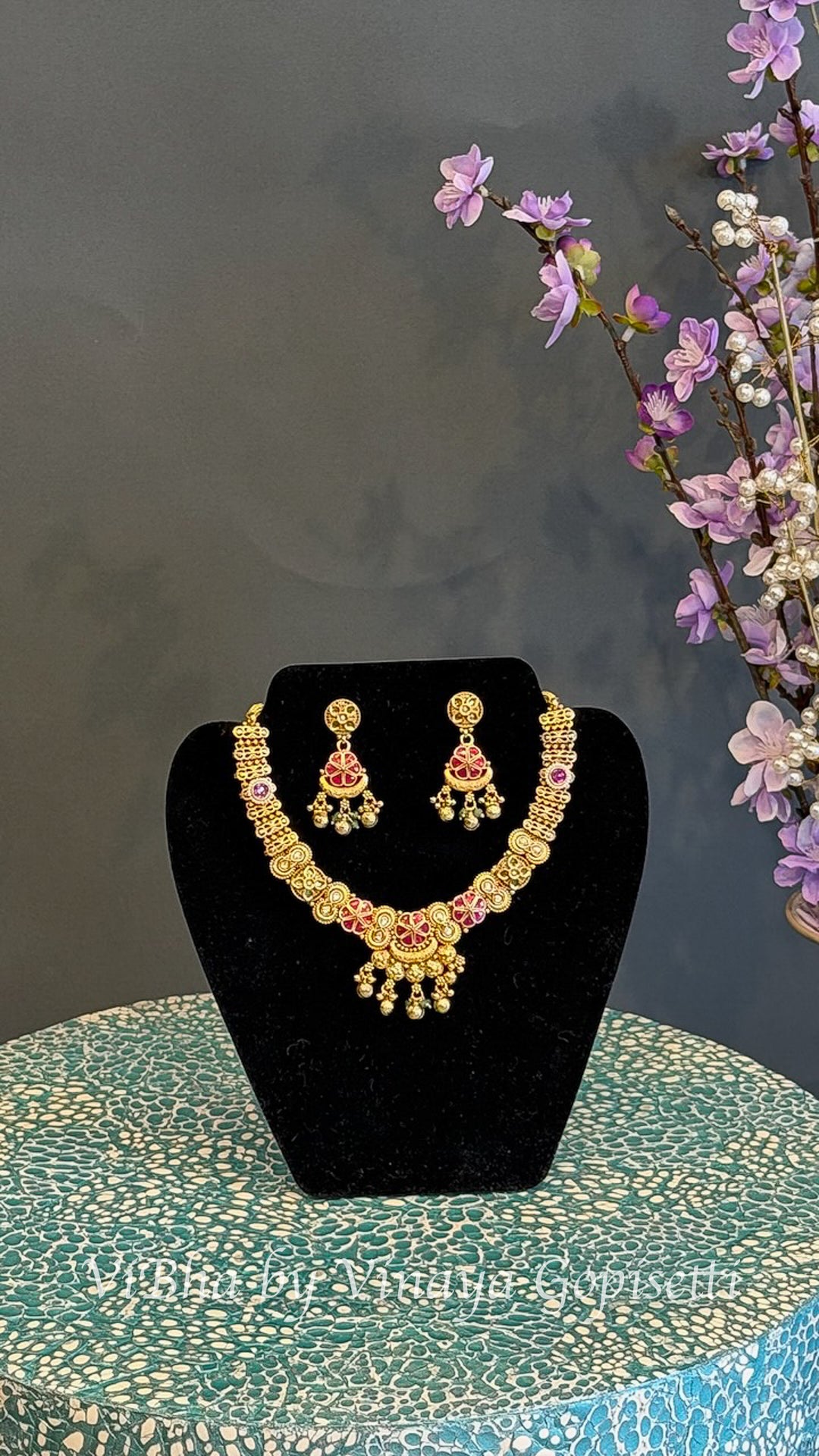 Gold Finish Floral Necklace Set with Pink Stones and Gold Bead Drops