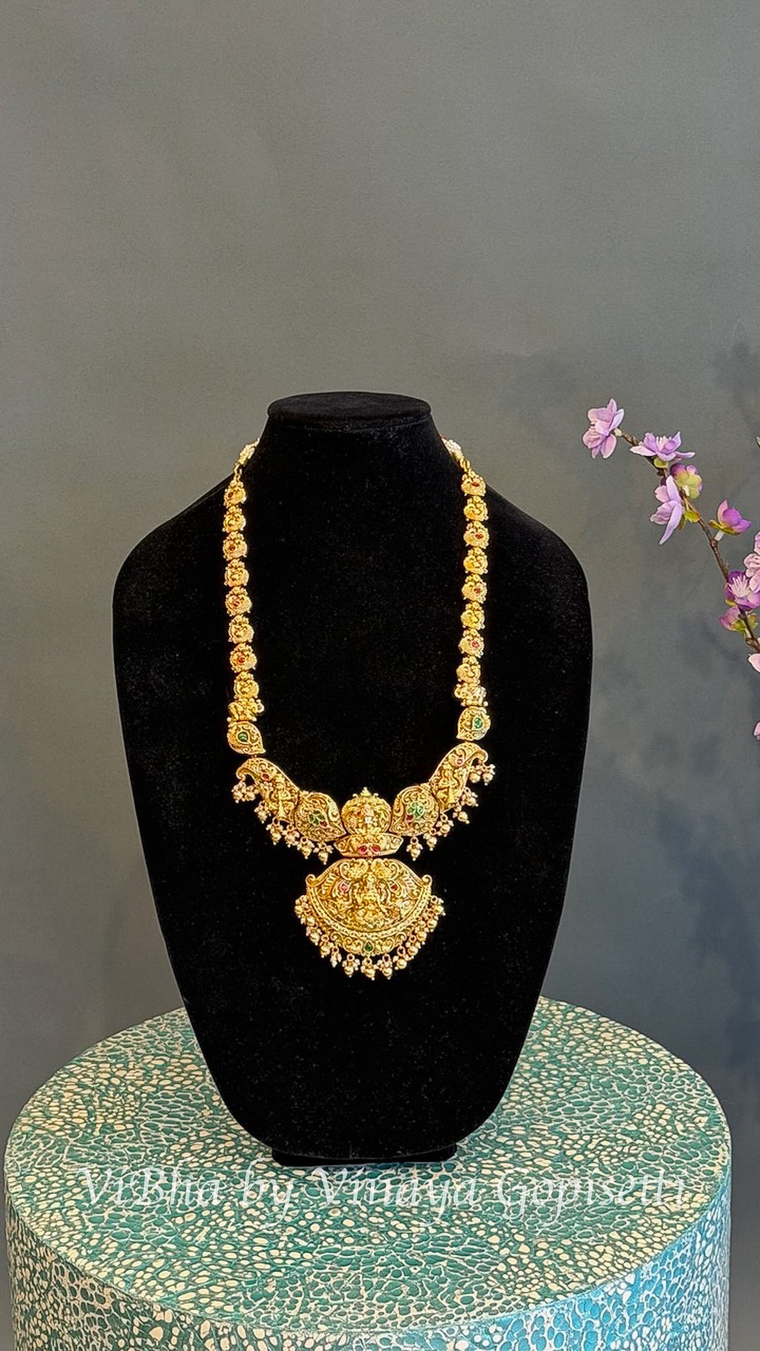 Gold Finish Lakshmi Temple Necklace Set with Red and Green Stones