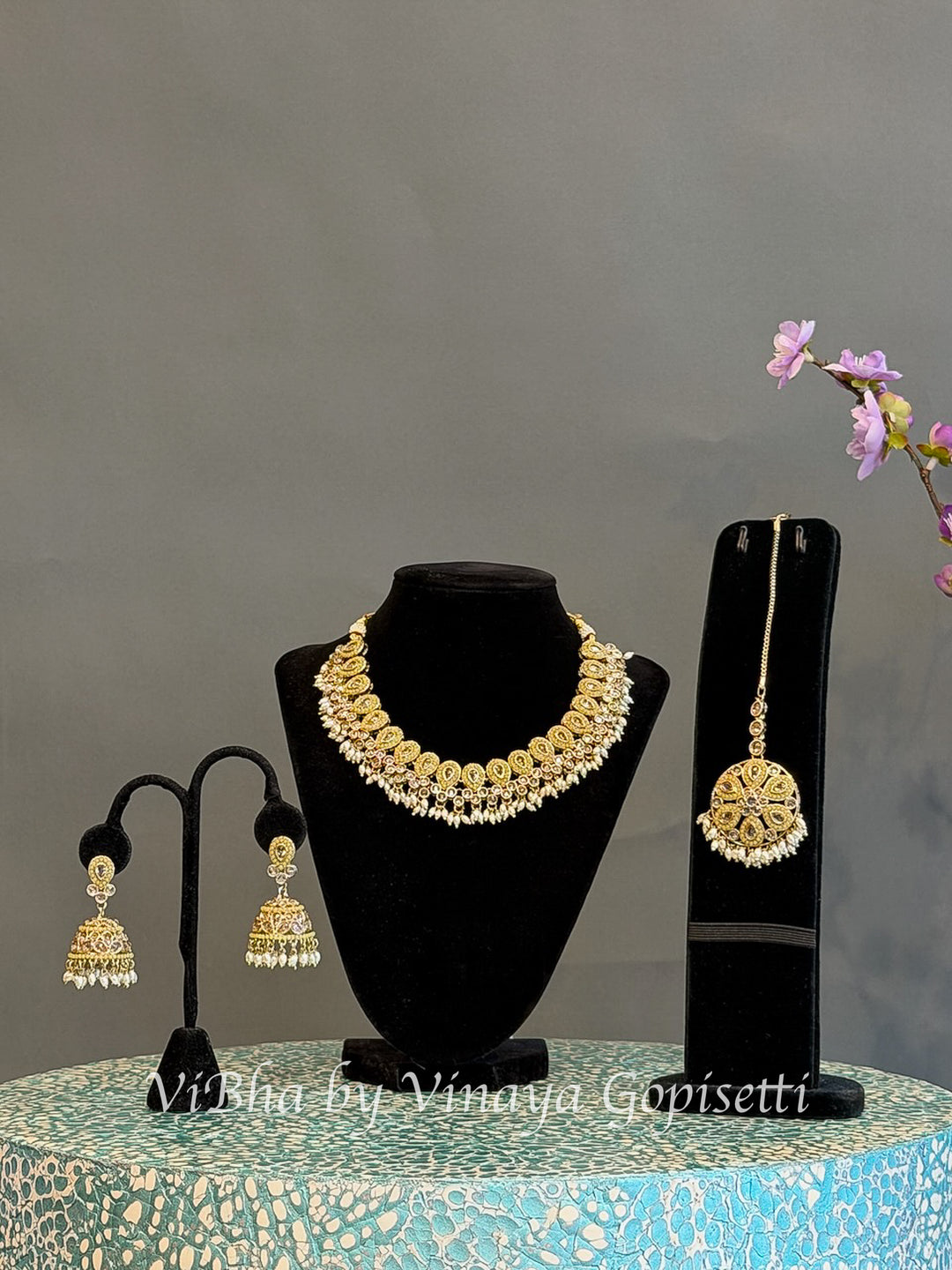 Gold Finish Paisley Necklace Set with Pearl Style Drops and Maang Tikka