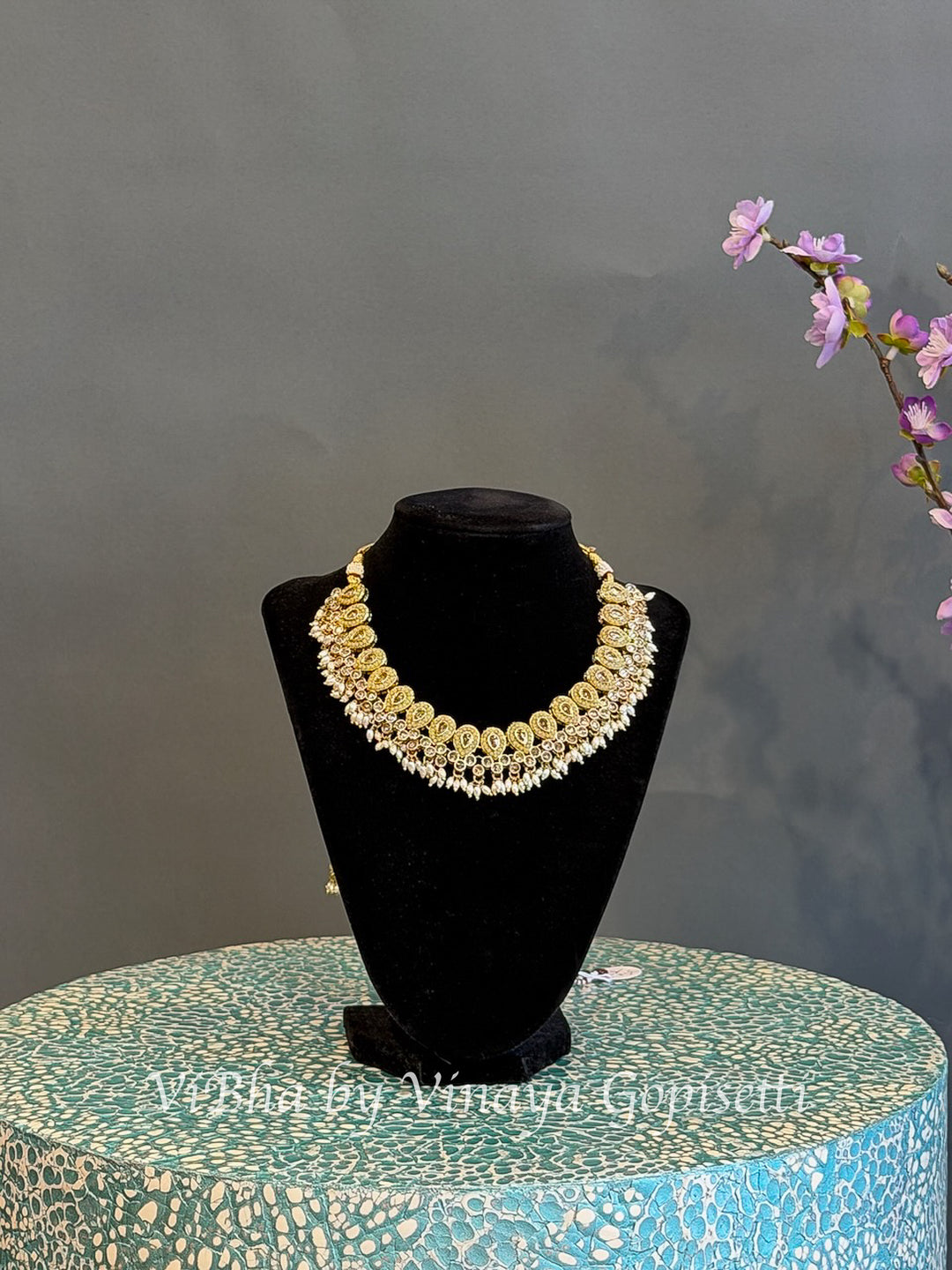 Gold Finish Paisley Necklace Set with Pearl Style Drops and Maang Tikka