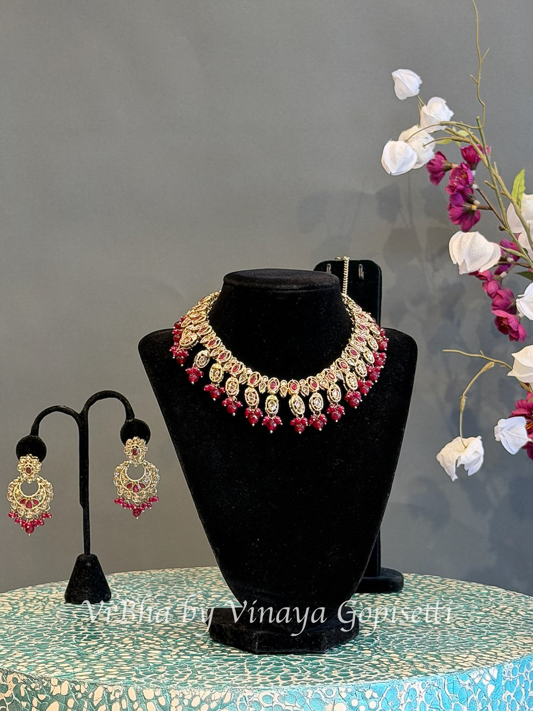 Gold Finish Red Stone and Bead Necklace Set with Maang Tikka