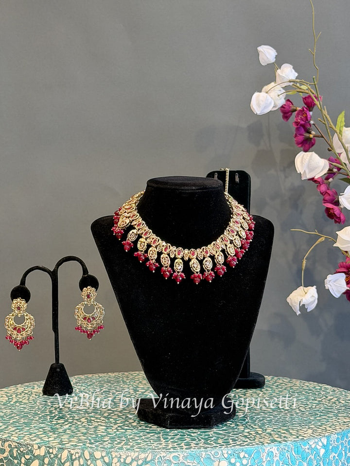 Gold Finish Red Stone and Bead Necklace Set with Maang Tikka